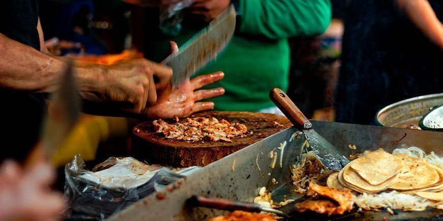 Meat is being prepared for Tacos at a food stall in Mexico City