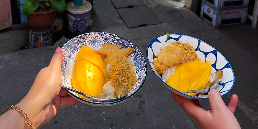 Two plates of mango sticky rice